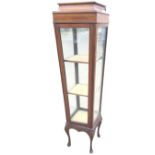 A square Edwardian mahogany display cabinet of tapering form with boxwood stringing to four glazed