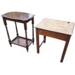 A hardwood school desk with hinged lid beside pen groove & inkwell aperture, raised on square