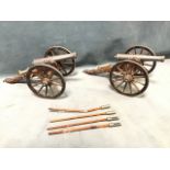 A pair of Dahlgren 1861 US Civil War field cannon models, the pewter barrels mounted on long trail