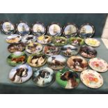 A collection of display and commemorative plates - boxer dogs by Simon Mendez, Royal Doulton naval