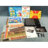 Five boxed board games, puzzles, jigsaws, etc; together with an electronic chess board and manual