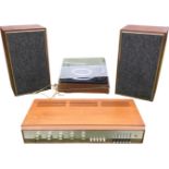 A 1960s teak cased stereo hi-fi system - a Garrard turntable, a Goodman amplifier with radio, and