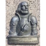 A German medieval style cast bust panel of a bearded armoured figure, the plinth reading Er Aber