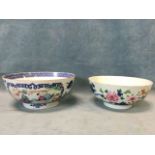 An C18th Chinese famille rose bowl with underglaze blue and enamelled floral decoration - 9.25in;