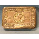 A brass WWI Princess Mary 1914 trenches tin with embossed decoration to hinged lid. (5in)
