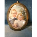 F Hewett, watercolour, miniature of two children with foliage, signed & dated 1914, the oval in