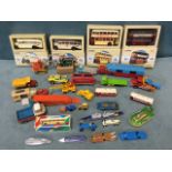 A collection toy vehicles - four boxed Corgi buses, land-speed record cars, loose Corgi and Matchbox