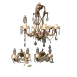 An Italian hanging glass chandelier with cup ceiling rose above three branches - each with twin arms