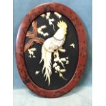 An Edwardian oval Japanese lacquer picture of a cockerel on branch with leaves, carved in abalone,