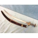 An Indian sword of tulwar style with polished steel curved blade and iron handle, the scabbard