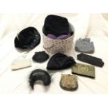 A hatbox containing a collection of bead purses, clutch bags, hats, handbags, bead mounted dress