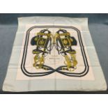 A Brides de Gala silk scarf by Hermès of Paris, having pale blue border framing horse tack & harness