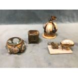 Four gilt metal Palais Royal objets de vertu - a pearl shell table bell on an alabaster base, a