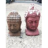 A painted composition buddha head - 19in; and another similar - 15.5in. (2)