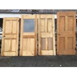 Four Victorian stripped pine four-panel doors, one with dimple glazed upper. (31.75in, 32.75in, 32.