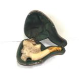 A Meerschaum pipe in the form of a bearded gentleman, having amber mouthpiece and velvet lined