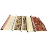 Five rolls of upholstery fabric - a bolt & scrap with scrolled flowering foliage on cream ground,