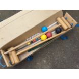 A contemporary boxed croquet set with four beech mallets, metal hoops, four balls, etc. (A lot)