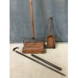 A Victorian ebony cane with horn handle and silver collar; a GR cast iron stove shovel; a stamped