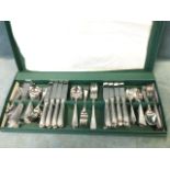An used boxed canteen of beaded stainless cutlery, the eight settings by Housley International.