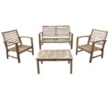 A set of teak garden furniture with bench, pair of armchairs and coffee table by Hartman, with