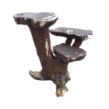 A garden table or stand formed from a treetrunk log with three platforms. (24in)