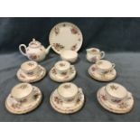 A Royal Worcester six-piece teaset decorated in the Roanoke pattern, the fluted pieces with floral