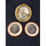 A Georgian oval silkwork picture of a classical lady feeding swans in a gilt gesso frame - 12in; and