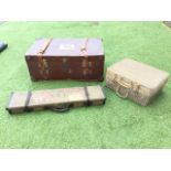 A canvas gun case with leather mounts and baize lining, bearing Churchill gunmakers labels; a