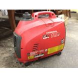 A Honda petrol generator - model EU 10i. (A/F)