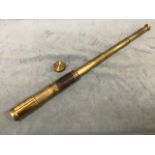 A Victorian brass three-draw telescope with leather mount, complete with lens cap and sliding eye-