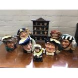 A collection of Royal Doulton character jugs - Captain Ahab, Mine Host, Falconer, Old Salt and