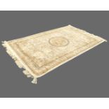 A chenille style rug woven with circular medallion on ivory scrolled field within bands of linked