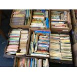 Seven boxes of childrens books including 32 Warne Beatrix Potters, Enid Blyton, novels,