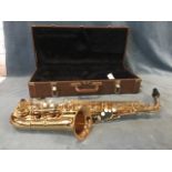 An Elkhart Blessing Saxophone, with velvet lined case. (28in)