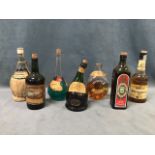 Seven bottles of spirits - cream de mente, Portuguese docura, Crabbie green ginger, armagnac,