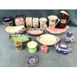 A collection of Maling ceramics including a pansie jar, an apple blossom ribbed jug, boat shaped