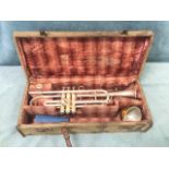 A cased Besson trumpet, a British made New Creation model numbered 133030, complete with mutes, John