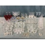 A collection of miscellaneous drinking glasses - cranberry, liqueur, brandy balloons, wine