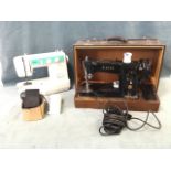 A Brother electric sewing machine with pedal - model BS-2125; and a large cased cast iron Singer