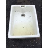 A glazed rectangular belfast sink with integral overflow. (24.25in)