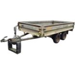 A 10ft twin-axel flatbed trailer, the rectangular platform with drop sides by Paxtons, with