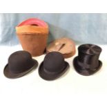 A cased top and bowler hat by Pellett of Manchester, the boxed pair in hessian and leather case with