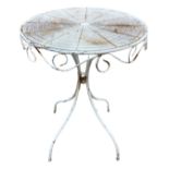 A circular painted garden table with wirework cobweb type top above a scrolled apron, raised on four