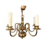 A Georgian style brass five arm chandelier, the baluster pendant with bun terminal having five