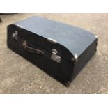 A shaped 1930s motoring trunk, the line box with leather handle and chromed mounts & locks. (31.