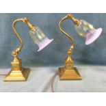 A pair of late Victorian style brass desk lamps, the square stepped bases with wreathes to columns