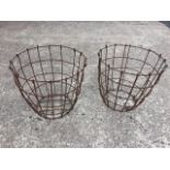 A pair of rusty old basket type containers. (21.75in x 19.75in) (2)