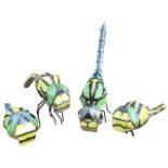 Four wacky six-legged garden insect models fabricated on metal frames, the beasts wired with