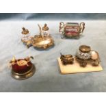 Four Palais Royal gilt metal objets de vertu - comprising an ormolu cut glass and shell inkstand, an